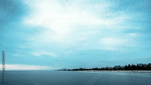 The bathing beach in Beibu Gulf, China, at dusk. photo