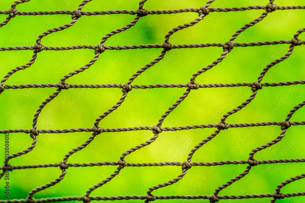 garden grid close up on grass background garden grid close up on grass background