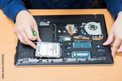 Technician support upgrade part and fixing laptop. select focus, Computer repair concept