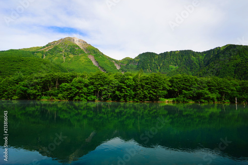 Taisho-ike pond and Mt. Yakedake, Kamikochi,Nagano, Japan photo