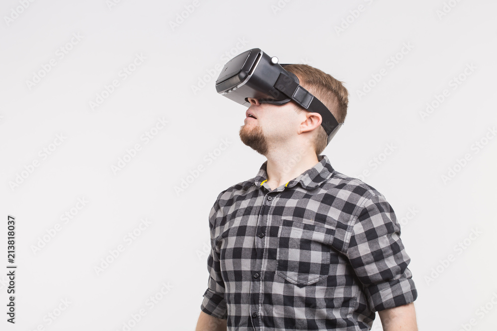 Side view of white men wearing vr glasses Side view of white men wearing vr glasses