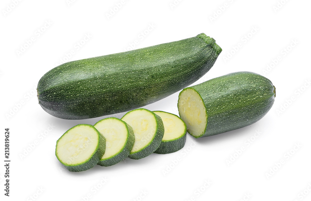 fresh green zucchini with slices isolated on white background fresh green zucchini with slices isolated on white background