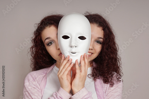 two-faced happy sad woman manic depression or schizophrenia concept