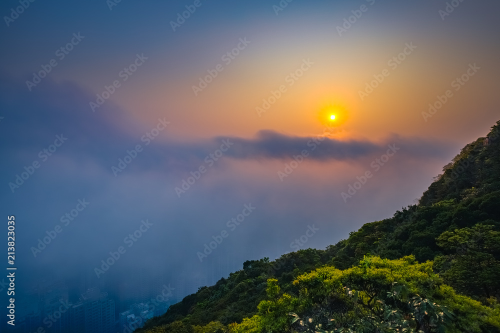 Misty City and Harbor at Sunrise - Victoria Harbor of Hong Kong Misty City and Harbor at Sunrise - Victoria Harbor of Hong Kong