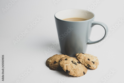Blue mug coffee with cookies