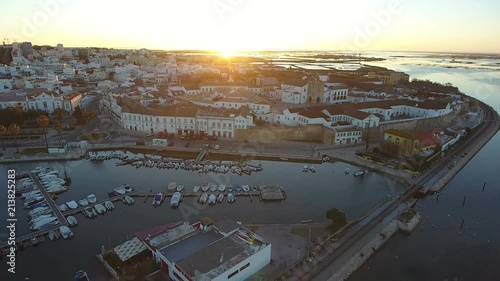 Aerial. Sunrise over the town of Faro. Historical villa.