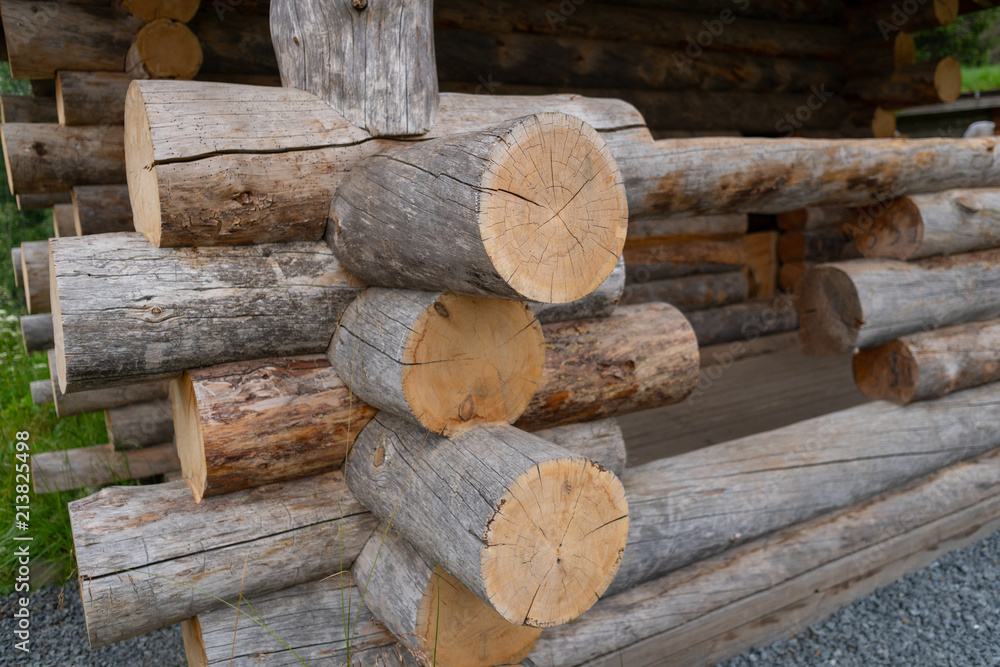 The corner of the wooden log cabin. The corner of the wooden log cabin.