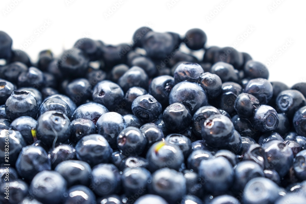 Blueberry berries closeup background. Antioxidant organic superfood concept. Healthy eating and nutrition Blueberry berries closeup background. Antioxidant organic superfood concept. Healthy eating and nutrition