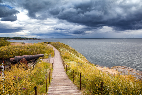 Wooden paths stairs along the coast on the island of Suomenlinna  a beautiful seascape. Islands of Finland