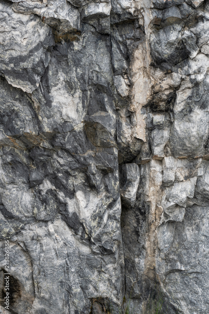Gray surface of marble stone with striped streaks. Gray surface of marble stone with striped streaks.