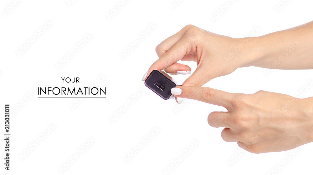 Charger for mobile phone in hand pattern on white background isolation Charger for mobile phone in hand pattern on white background isolation