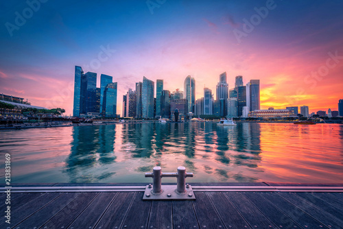 Photography Singapore Skyline and view of business district downtown on Marina Bay at sunset
