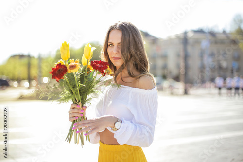Girl with colored flowers 