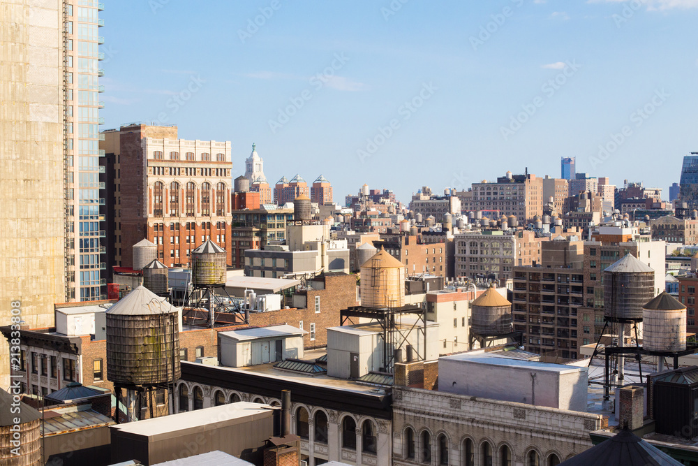 New York City Manhattan cityscape of buildings at midtown on sunny day New York City Manhattan cityscape of buildings at midtown on sunny day