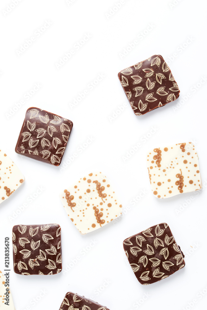 Square candy on a white background, top view.