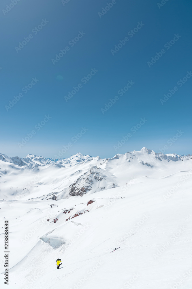 Winter snow covered mountain peaks in Caucasus. Great place for winter sports