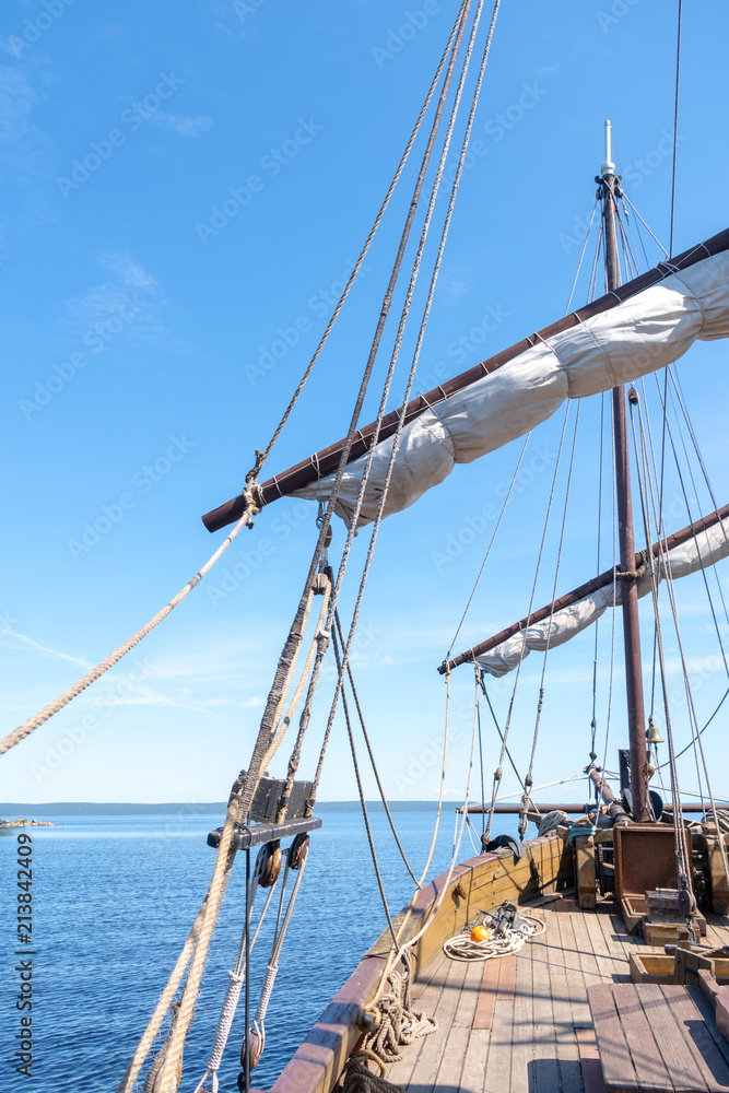 custom made wallpaper toronto digitalTigging and masts of an old sailing ship against the blue sky with clouds. Travel adventure and travel concept, copy space.