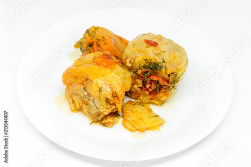 delicious red bell peppers stuffed with minced meat on white plate