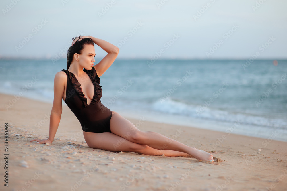 The beautiful bikini model on sunset The beautiful bikini model on sunset