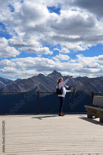 Girl Taking Photo Selfie in Mountains in Canada