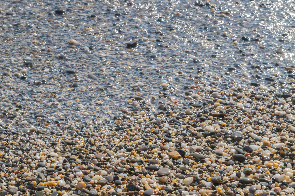 Sea stones on the seashore in the summer Sea stones on the seashore in the summer