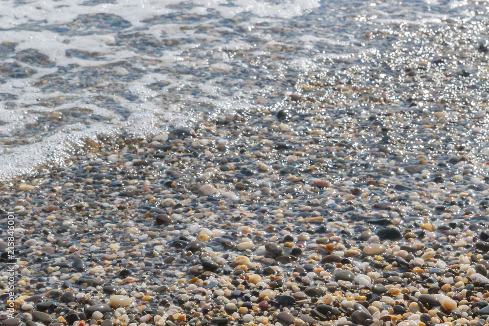Sea stones on the seashore in the summer Sea stones on the seashore in the summer