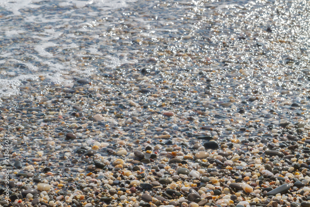 Sea stones on the seashore in the summer Sea stones on the seashore in the summer