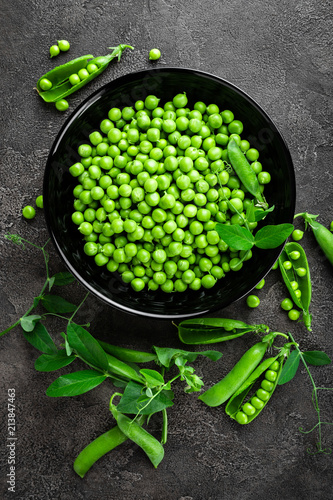 Green peas with pods and leaves