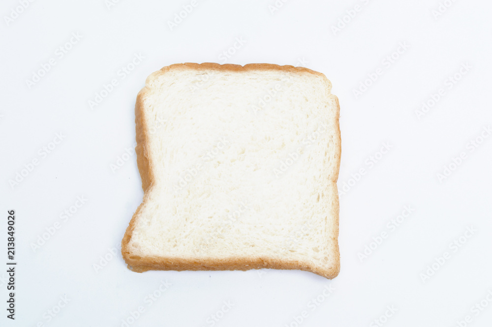cutting wheat bread  isolated on a white background