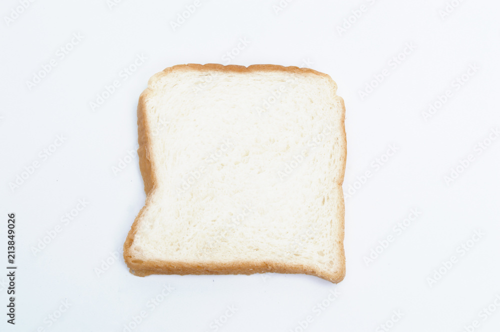 cutting wheat bread isolated on a white background cutting wheat bread isolated on a white background