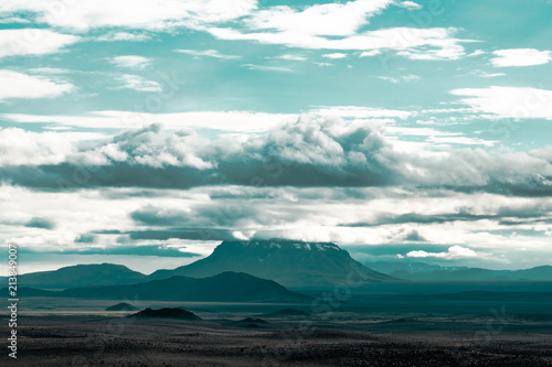 A mountain looming in the distance in Iceland
