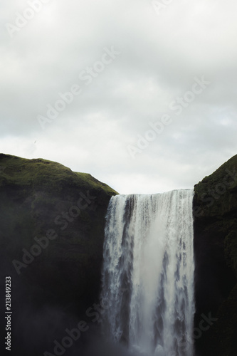 A dramatic shot of a waterfall in Iceland