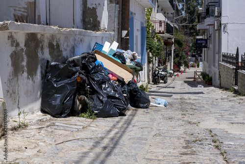  Big pile of municipal waste on the street as concept for urban pollution