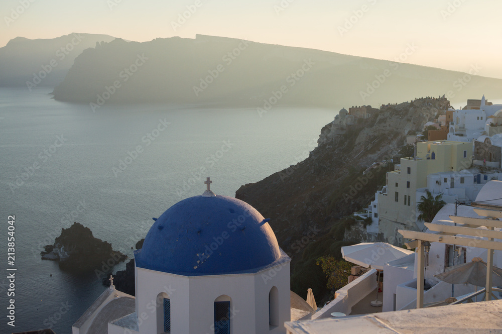 Whitewashed Houses and Church on Cliffs with Sea View in Oia, Santorini, Cyclades, Greece