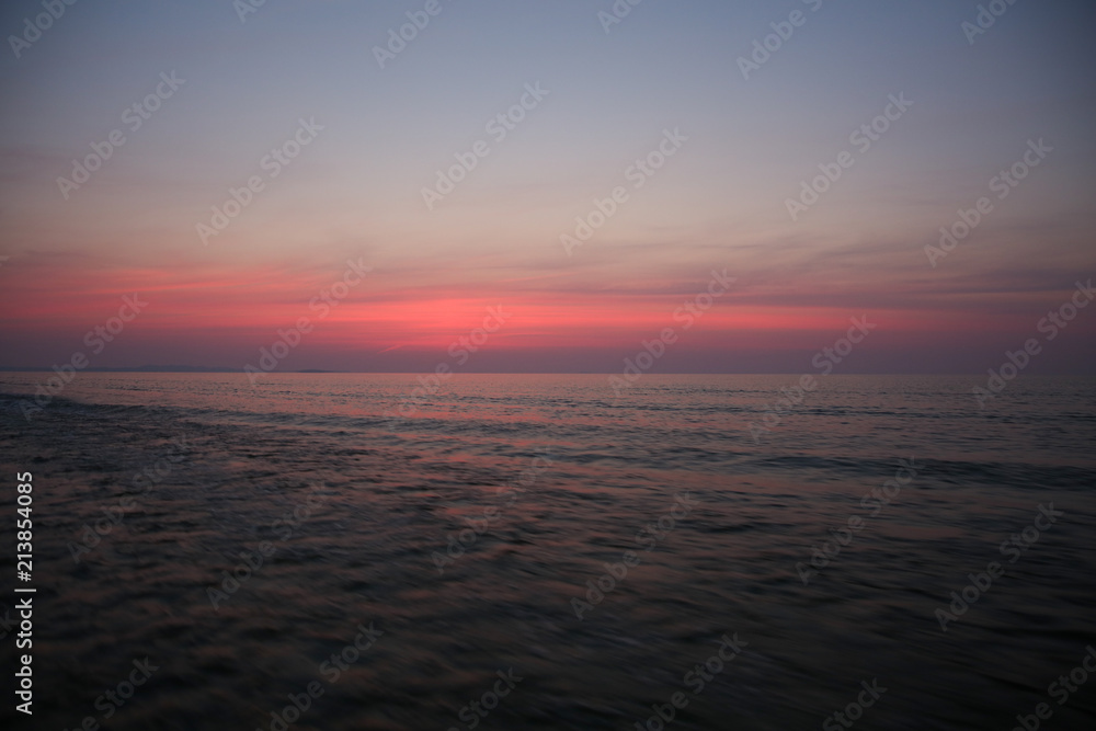 Sunrise seen from a speeding rubber raft