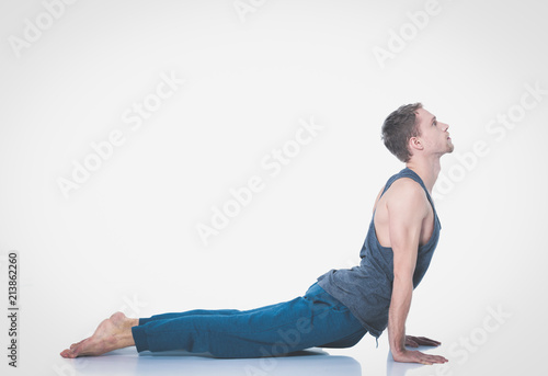 Young man practicing yoga. Yoga. Yoga Instructor