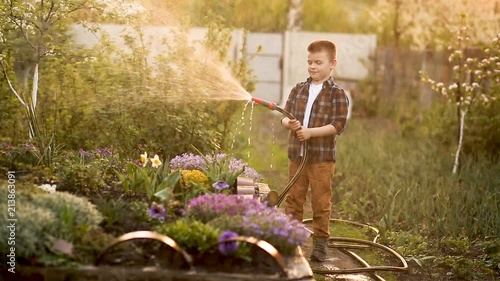 Wallpaper Mural Adorable child helping parents to grow vegetables and having fun. Torontodigital.ca