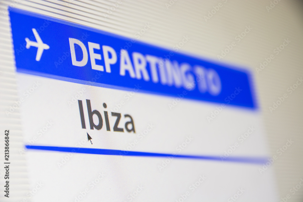 Computer screen close-up of status of flight departing to Ibiza, Spain Computer screen close-up of status of flight departing to Ibiza, Spain