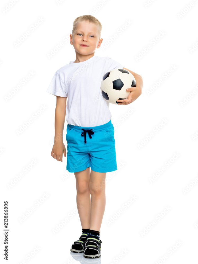 Little boy is playing with a soccer ball. Little boy is playing with a soccer ball.
