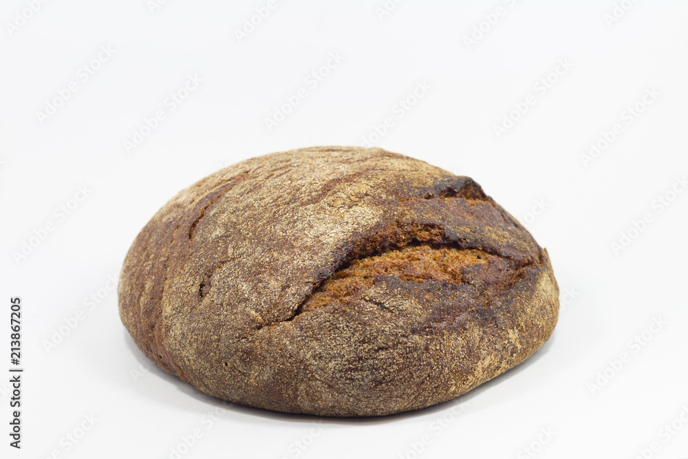 Delicious round rye bread isolated on a white background.Whole fresh healthy baked goods.Useful for vegans Delicious round rye bread isolated on a white background.Whole fresh healthy baked goods.Useful for vegans