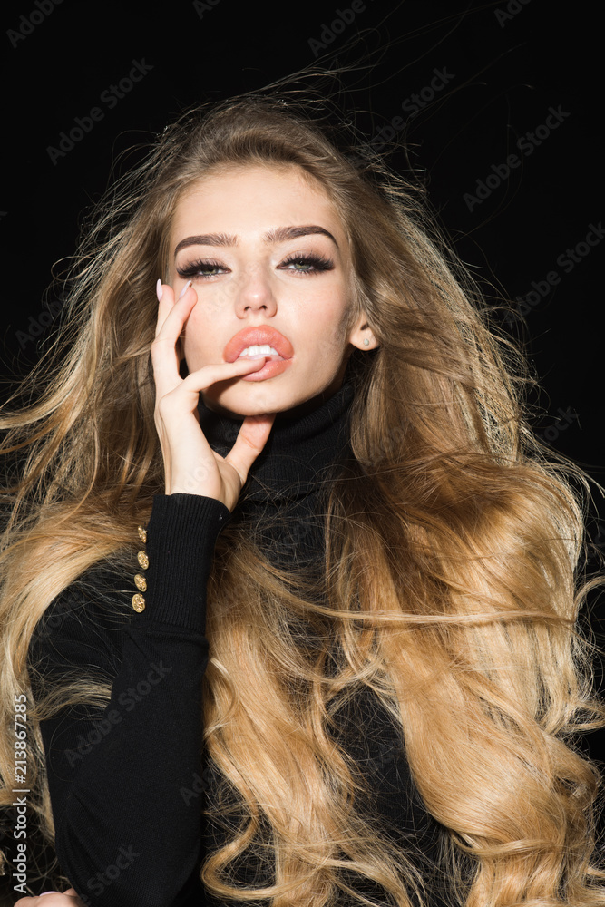 Woman fashion model with curly hair and makeup. Treatment, haircare,  skincare, spa procedures. Woman with long beautiful hair. Beautiful girl  with shiny wavy hair. Blonde model with curly hairstyle. Stock Photo |