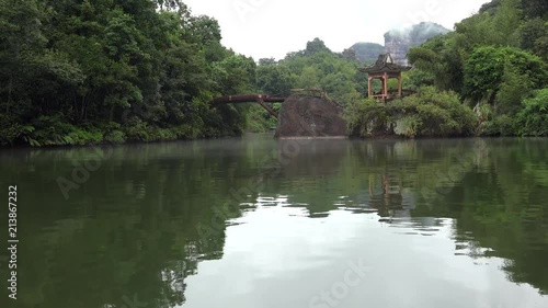 View from the Xiang Long Lake boat with the Jade Belt bridge at the Mount Danxia geopark. Guangdong, China photo