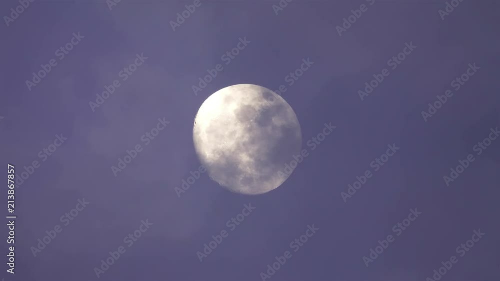 Big full moon behind moving clouds in 4K Big full moon behind moving clouds in 4K