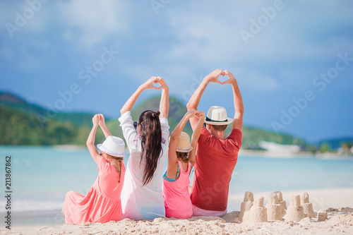Happy beautiful family on the beach