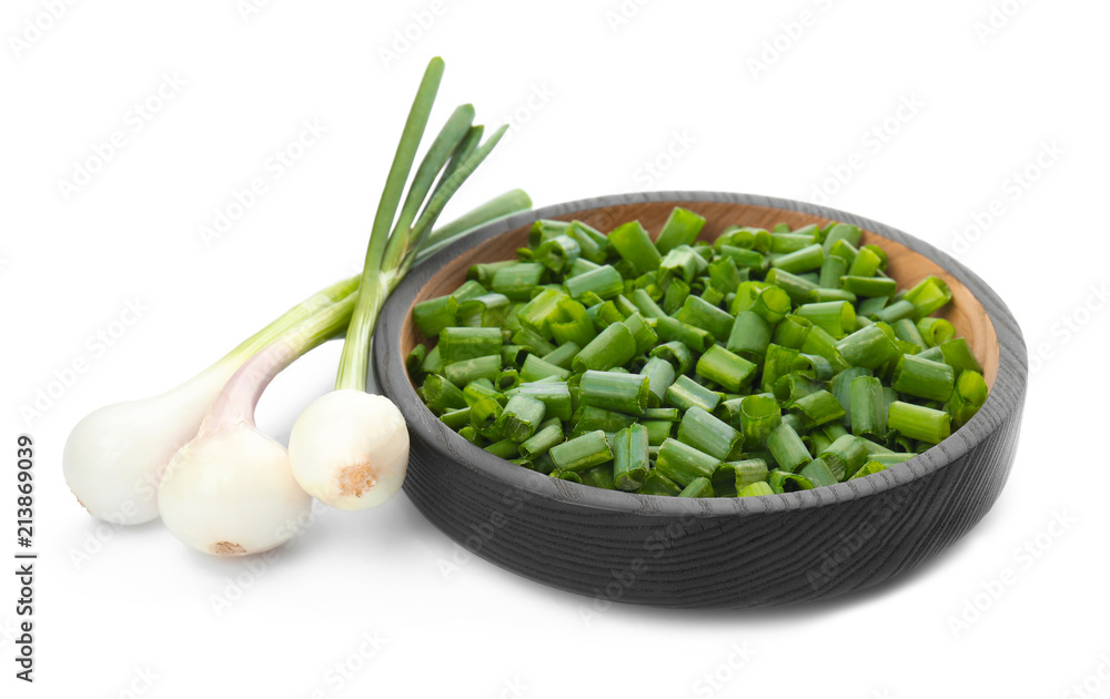 Bowl with chopped green onion and stems on white background Bowl with chopped green onion and stems on white background