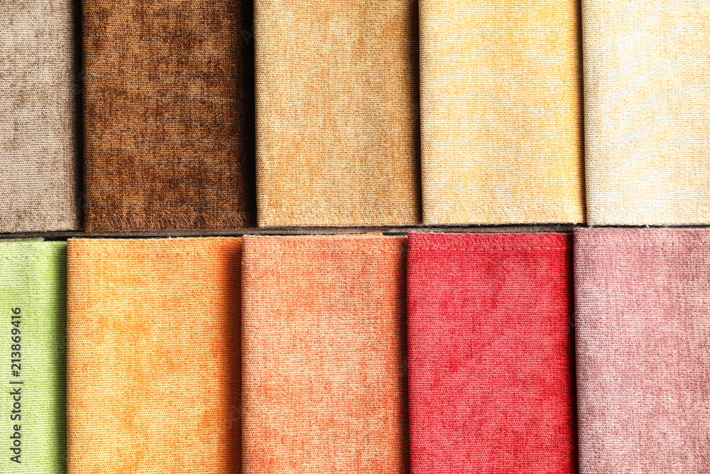 Fototapeta premium Fabric samples of different colors for interior design as background