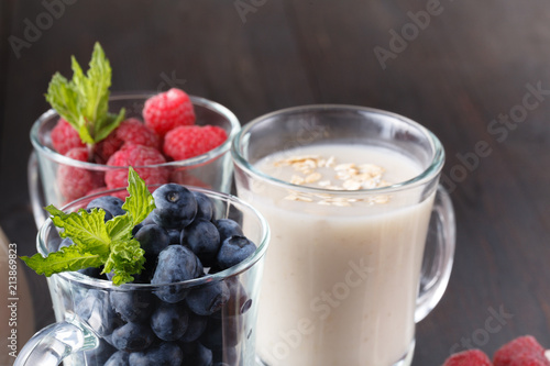 berry smoothie with oatmeal in a glass  healthy eating diet concept
