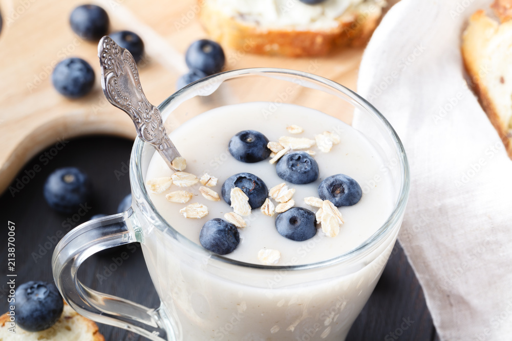 Closeup of oat milk, the concept of a vegetarian diet Closeup of oat milk, the concept of a vegetarian diet