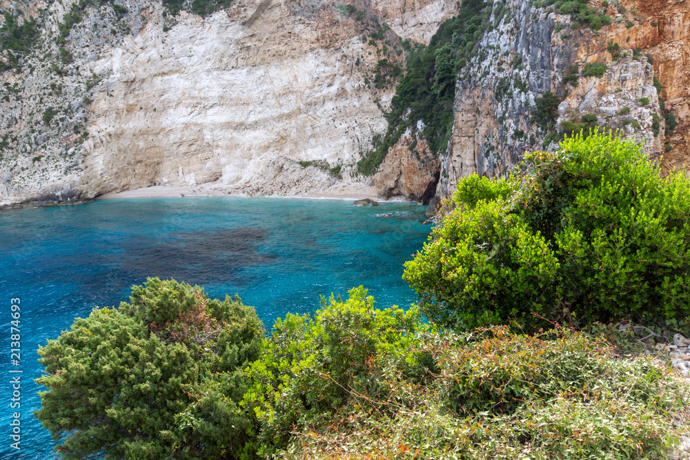 Fototapeta premium Blue water and rocks of beach at Zakynthos island, Greece