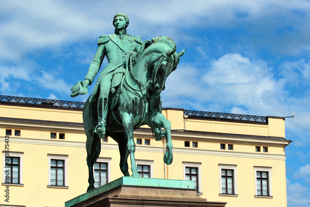 Norwegian Royal Palace (Slottet) and Statue of King Charles John XIV in Oslo, Norway.